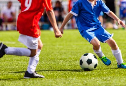 SYA soccer players on the field