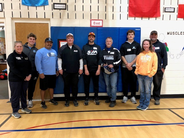 Little league coaches in gym at union mill elementary school