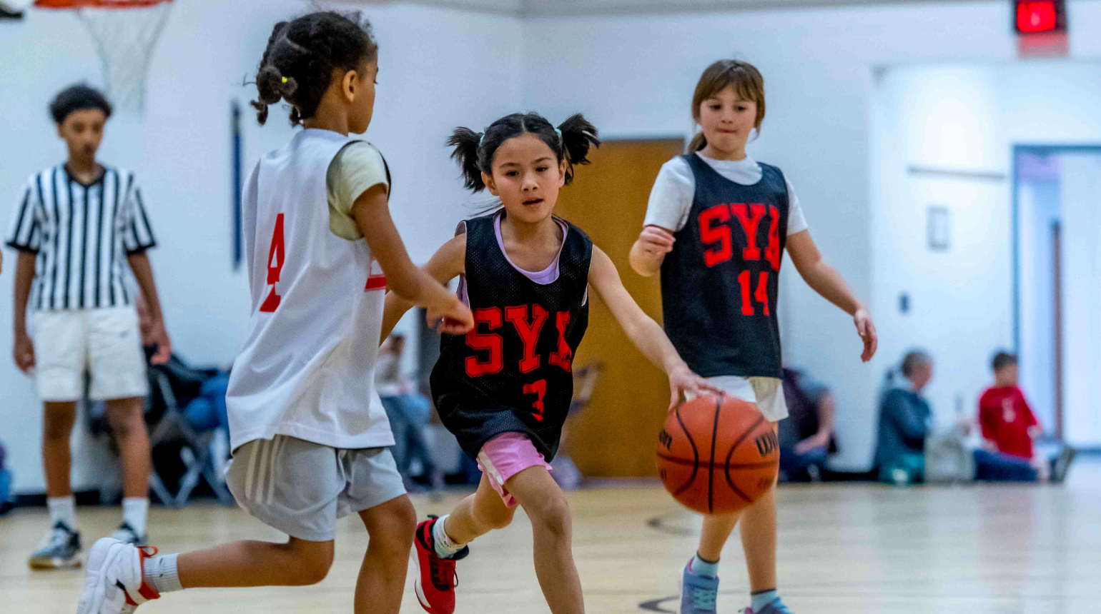 SYA House Basketball girl dribbling